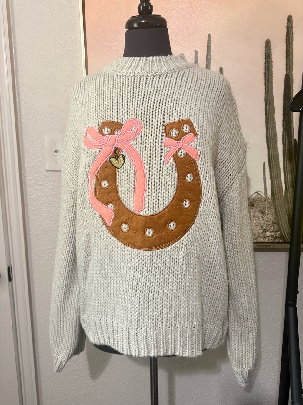 Maeve Cream Knit Sweater with Brown Horseshoe and Pink Bows